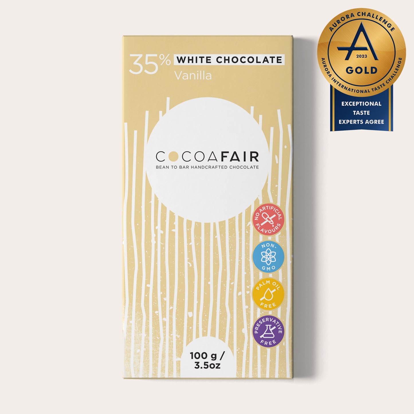 COCOAFAIR 100g 35% White Chocolate Packaging shot - Front view, Cream packaging on white background. Vanilla flavoured chocolate. Aurora Challenge 2023 Gold Winner