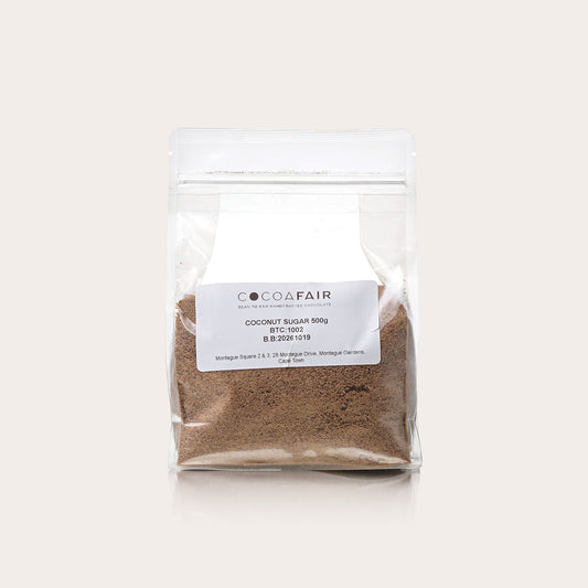 Clear 500g plastic packaging with coconut sugar against a white background, front of packaging